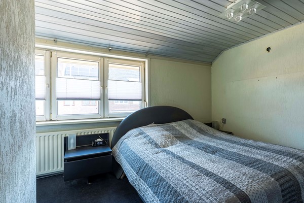 Foto - Te koop: Leuke, uitgebouwde tussenwoning uit 1927 met 3 slaapkamers en garage in de wijk Heksenberg